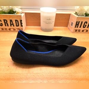 Rothy's Elegant Black Flats with Blue Trim